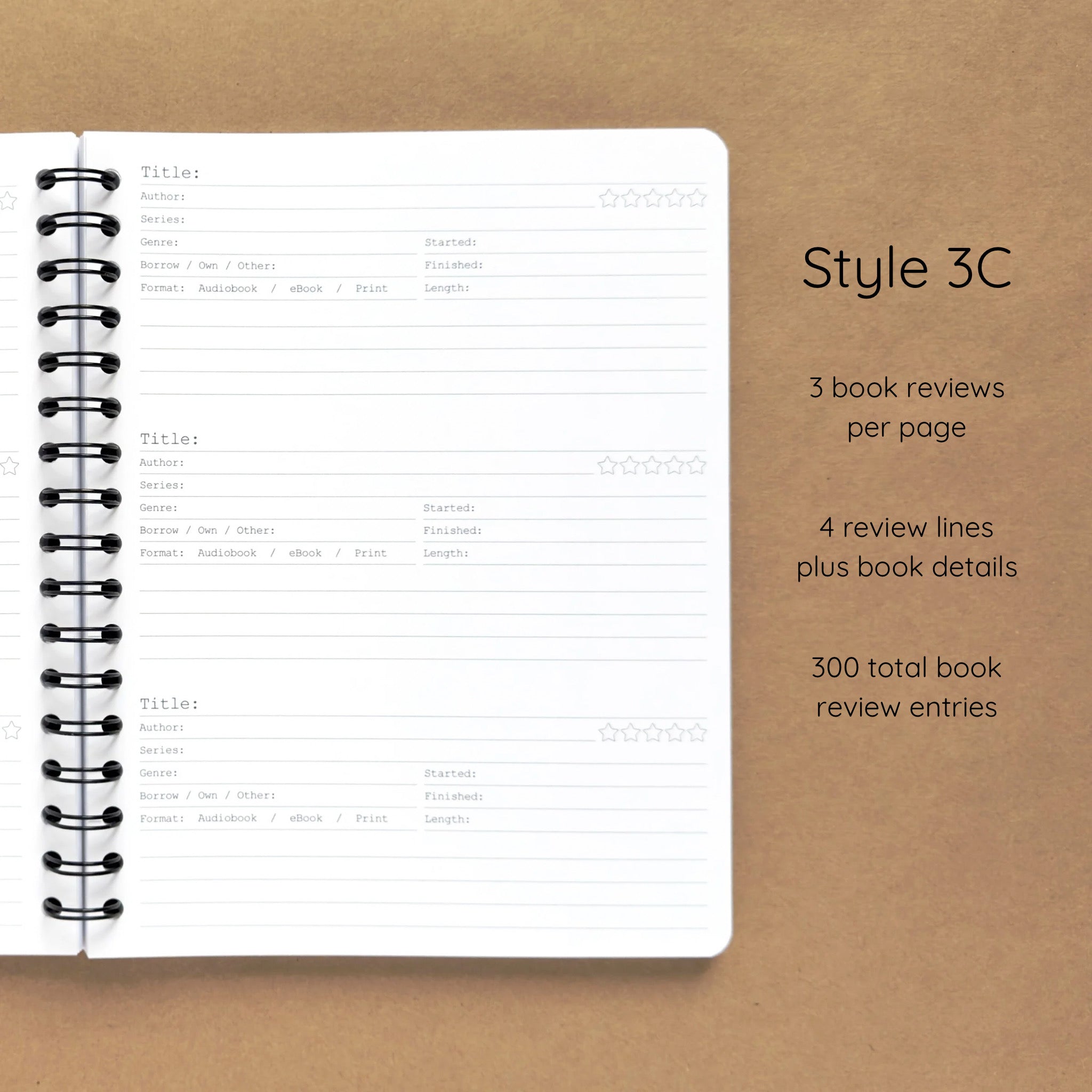 Open spiral-bound softcover reading journal notebook showing review template option Style 3C featuring three book reviews per page and four review lines plus book details per review, displayed on a brown background