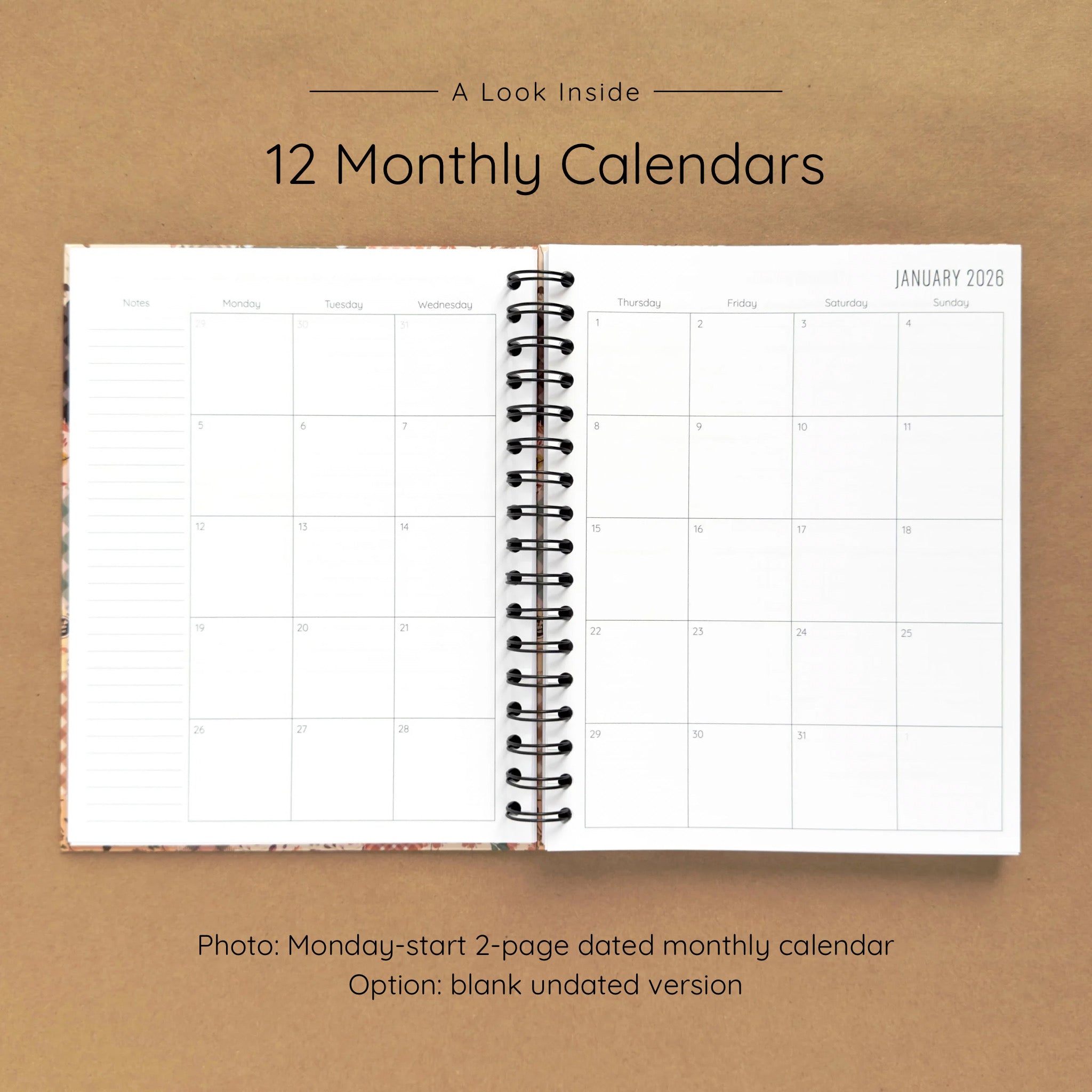 Open spiral-bound hardcover reading journal notebook showing monthly calendar pages on a brown background