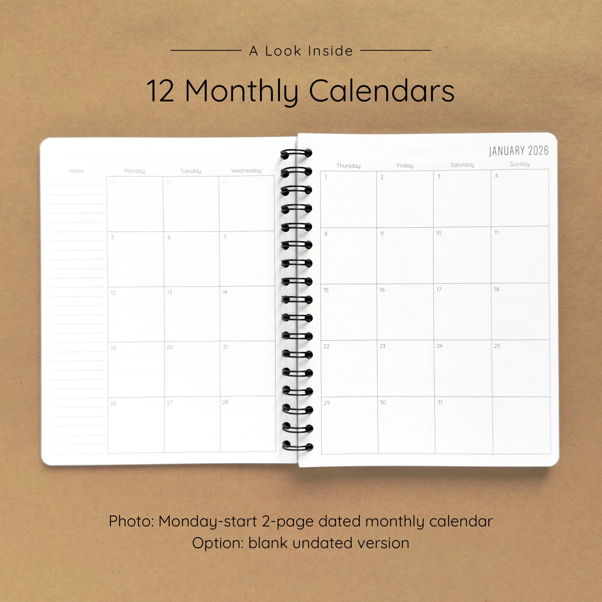 Open spiral-bound softcover reading journal notebook showing monthly calendar pages on a brown background