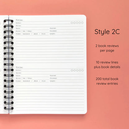 Open spiral-bound softcover reading journal notebook showing review template option Style 2C featuring two book reviews per page and ten review lines plus book details per review, displayed on a peach background