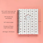 Spiral-bound hardcover reading journal notebook with books and bows coquette cover design on a peach background, featuring details and dimensions