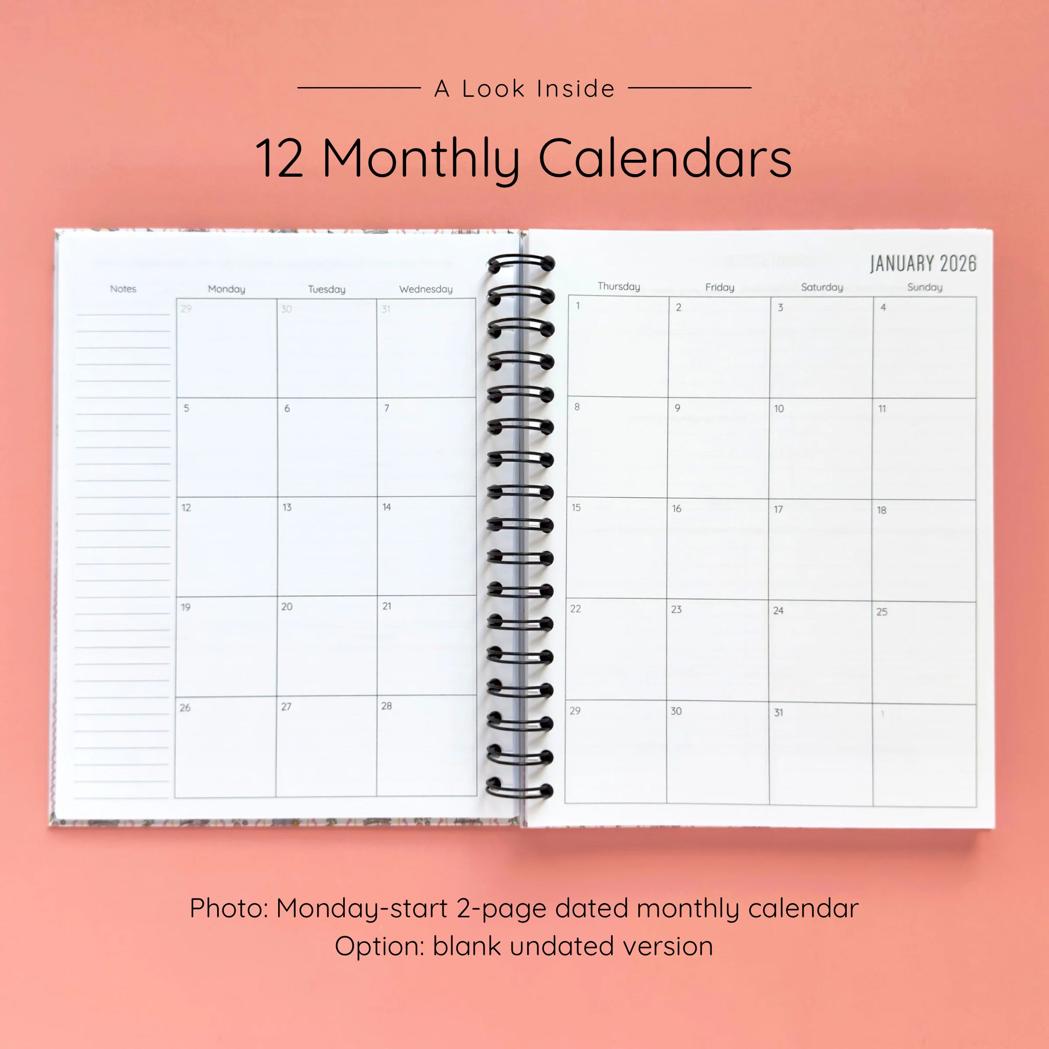 Open spiral-bound hardcover reading journal notebook showing monthly calendar pages on a peach background