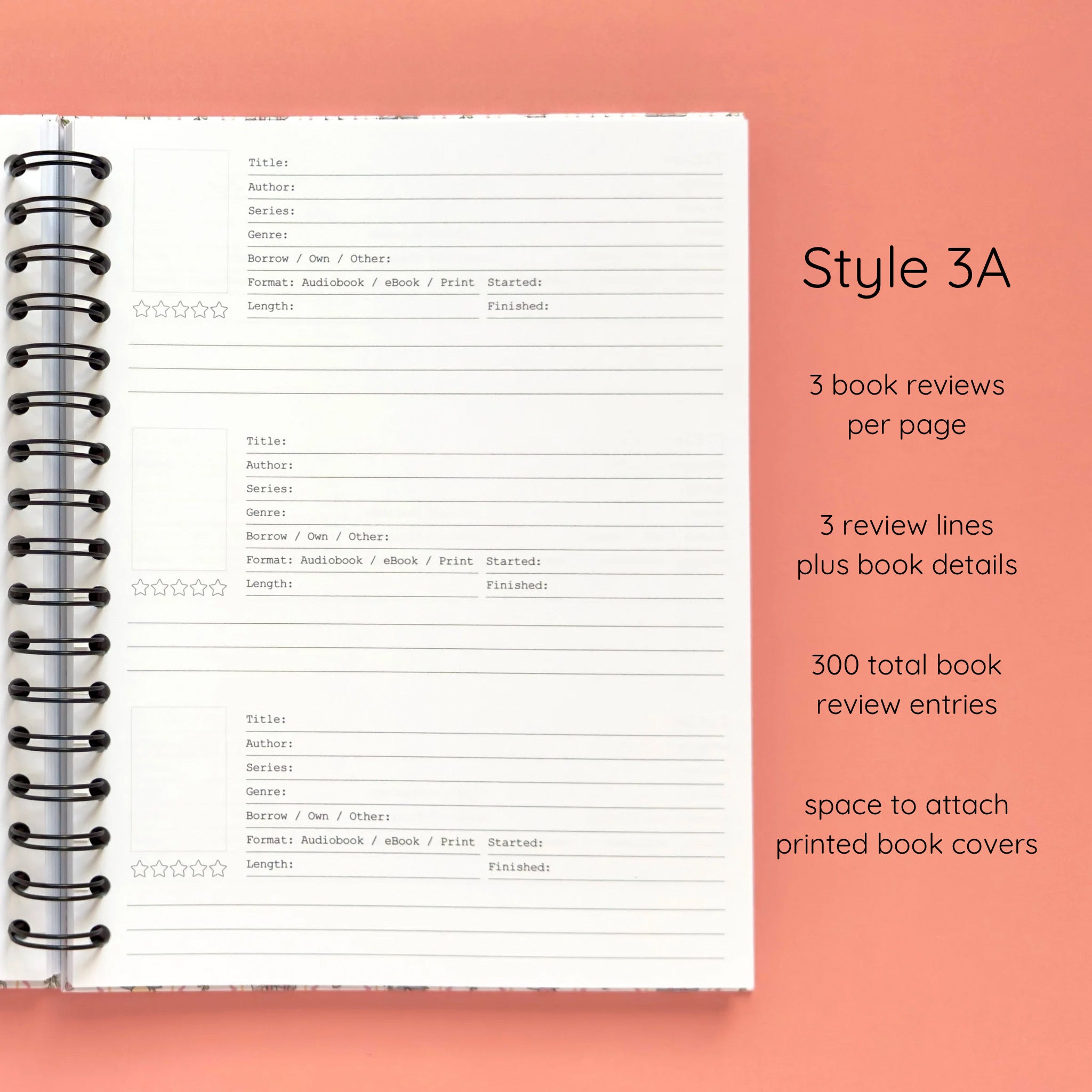 Open spiral-bound hardcover reading journal notebook showing review template option Style 3A featuring three book reviews per page and three review lines plus book details per review with space to attach printed book covers, displayed on a peach background