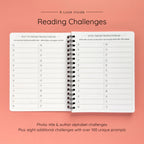 Open spiral-bound softcover reading journal notebook showing alphabet reading challenges on a peach background