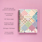 Spiral-bound softcover reading journal notebook with floral patchwork cover design on a lavender background, featuring product details and dimensions