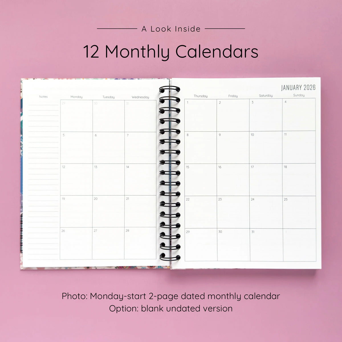 Open spiral-bound hardcover reading journal notebook showing monthly calendar pages on a lavender background