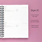 Open spiral-bound hardcover reading journal notebook showing review template option Style 2C featuring two book reviews per page and ten review lines plus book details per review, displayed on a lavender background