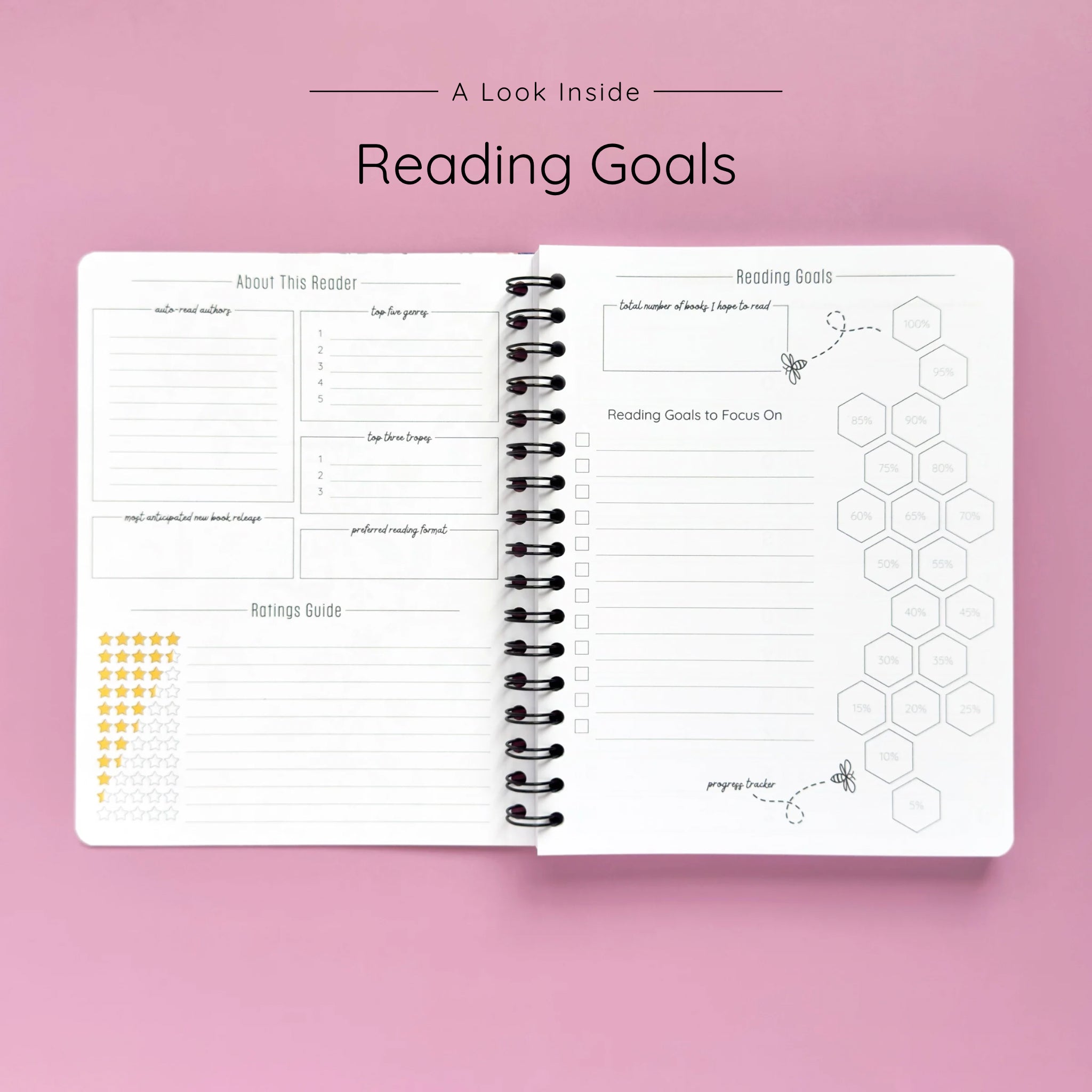Open spiral-bound softcover reading journal notebook showing reading goals and ratings guide on a lavender background