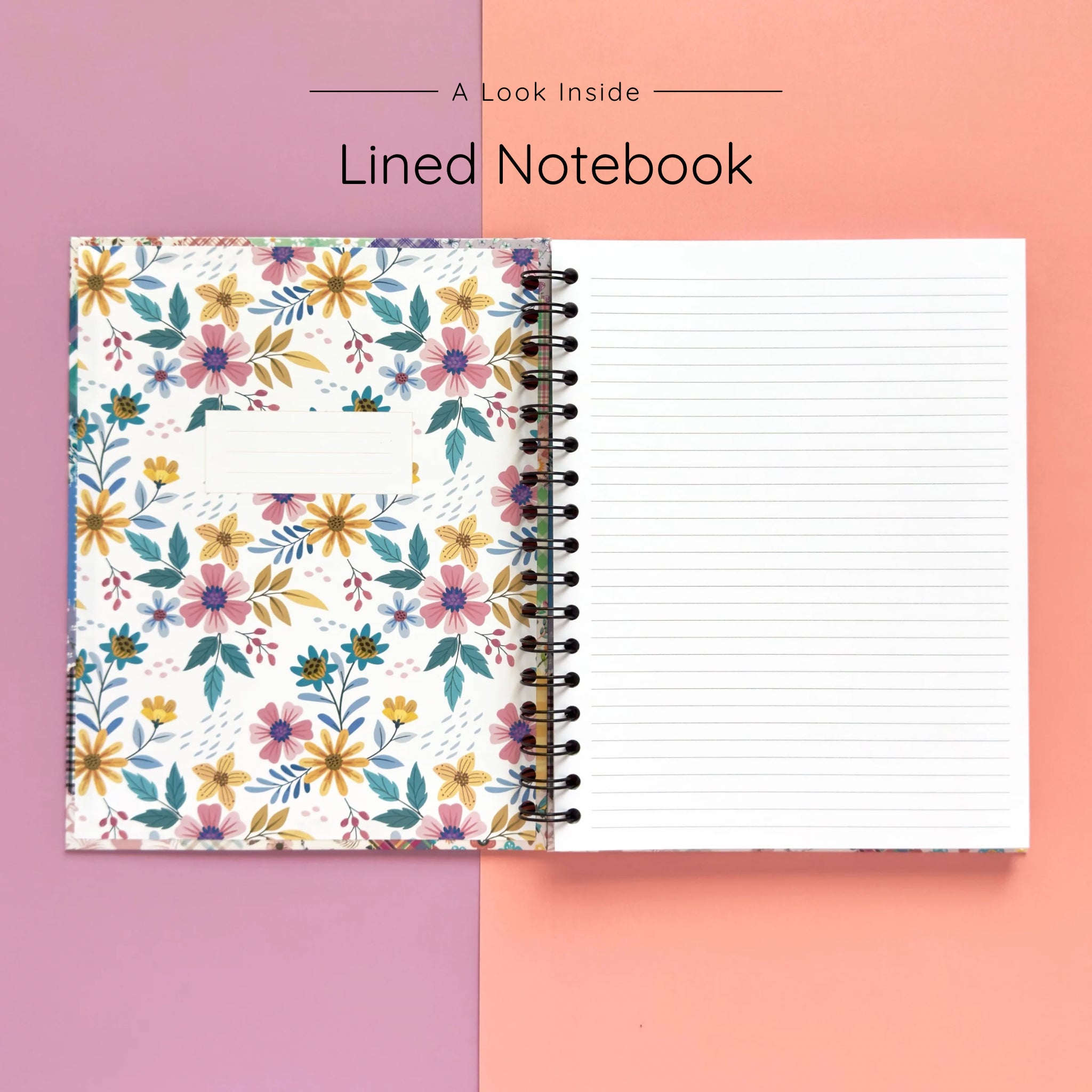 Open spiral-bound softcover lined notebook showing lined notes pages on a yellow and orange background, featuring white wire binding